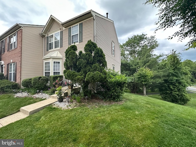 10215 Goosecreek Ct, Clinton, MD 20735 - view of home's exterior with a yard