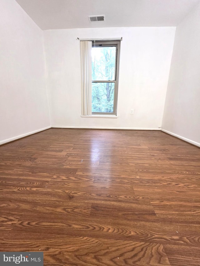 3376 Woodburn Rd, Annandale, VA 22003 - unfurnished room with dark wood-type flooring and baseboards