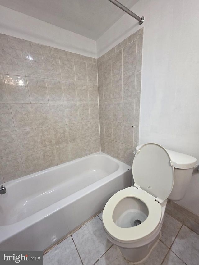 3376 Woodburn Rd, Annandale, VA 22003 - full bathroom featuring tile patterned flooring and  shower combination