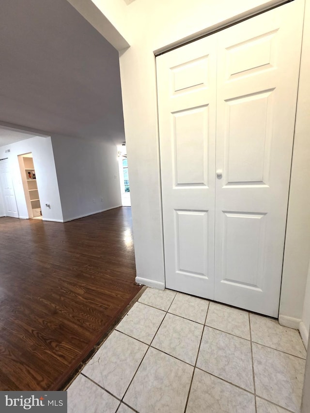 3376 Woodburn Rd, Annandale, VA 22003 - hallway featuring light wood-type flooring and baseboards