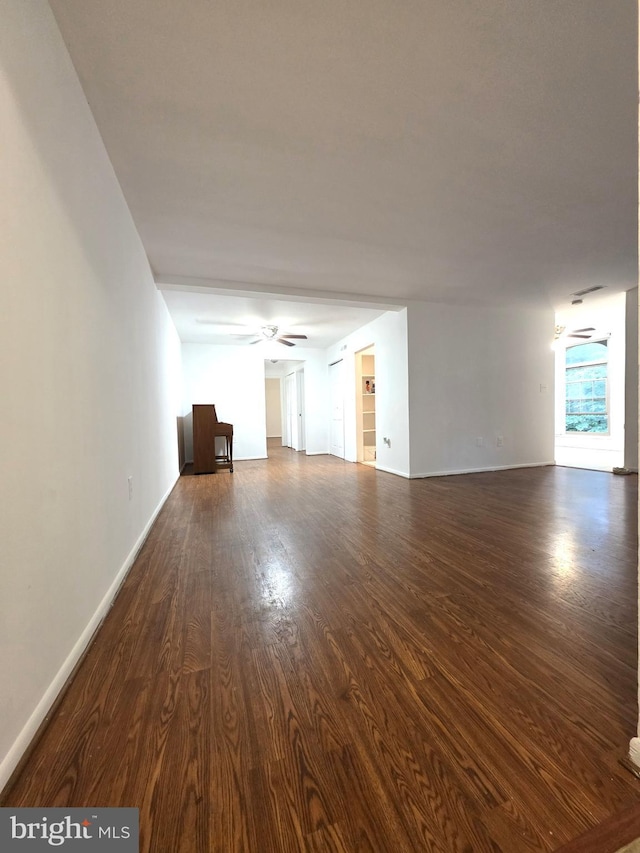 3376 Woodburn Rd, Annandale, VA 22003 - unfurnished living room with dark wood finished floors and ceiling fan