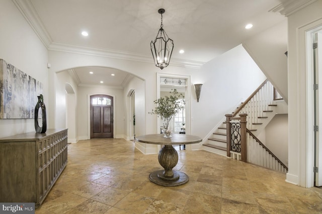 5420 Moorland Ln, Bethesda, MD 20814 - entrance foyer with arched walkways, stone tile flooring, stairway, recessed lighting, and crown molding