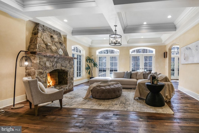 5420 Moorland Ln, Bethesda, MD 20814 - living room featuring hardwood / wood-style flooring, french doors, baseboards, a stone fireplace, and ornamental molding