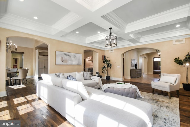 5420 Moorland Ln, Bethesda, MD 20814 - living room featuring arched walkways, a chandelier, wood finished floors, beamed ceiling, and ornamental molding