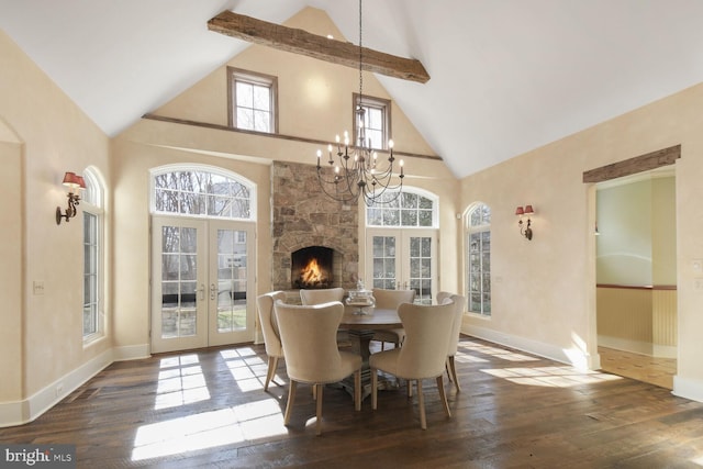5420 Moorland Ln, Bethesda, MD 20814 - dining space featuring high vaulted ceiling, french doors, wood-type flooring, a chandelier, and baseboards