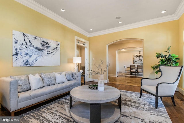 5420 Moorland Ln, Bethesda, MD 20814 - living room featuring arched walkways, ornamental molding, wood finished floors, baseboards, and recessed lighting