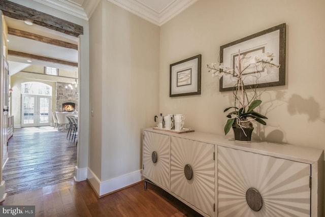 5420 Moorland Ln, Bethesda, MD 20814 - hallway with dark wood-style floors, baseboards, ornamental molding, french doors, and beam ceiling