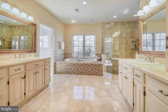 5420 Moorland Ln, Bethesda, MD 20814 - full bath with two vanities, a stall shower, a bath, recessed lighting, and marble finish flooring