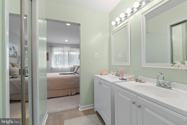13 Tulip Ct, Mount Laurel, NJ 08054 - full bath with ensuite bathroom, two vanities, wood finished floors, recessed lighting, and baseboards