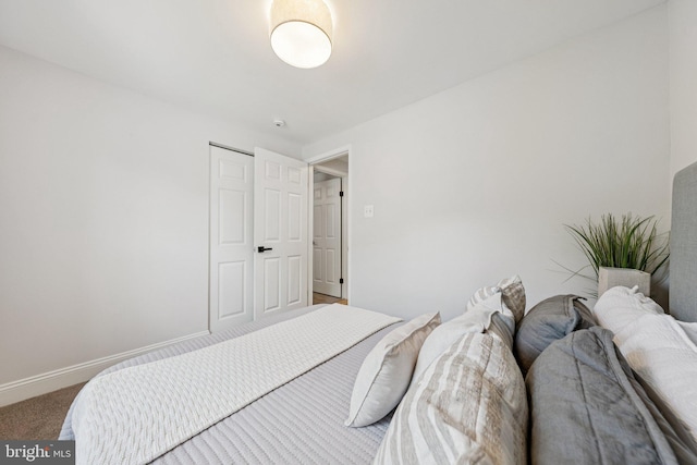 12711 Lampton Ln, Fort Washington, MD 20744 - carpeted bedroom featuring baseboards and a closet