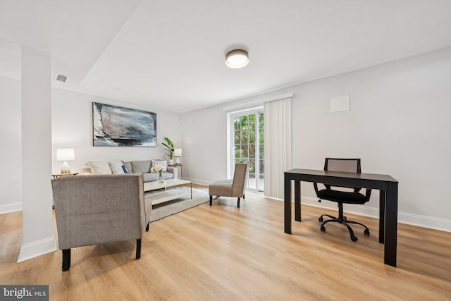 12711 Lampton Ln, Fort Washington, MD 20744 - home office with light wood finished floors and baseboards