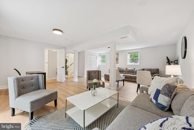 12711 Lampton Ln, Fort Washington, MD 20744 - living room with light wood-style floors and baseboards