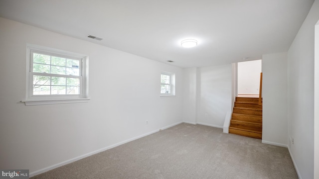 13413 Winterspoon Ln, Germantown, MD 20874 - unfurnished room featuring stairs and light carpet