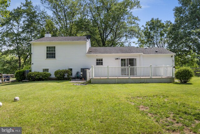 13413 Winterspoon Ln, Germantown, MD 20874 - back of house with a wooden deck and a chimney