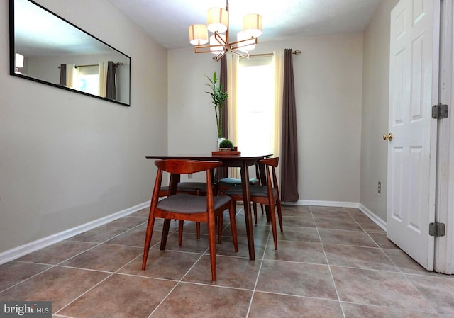 8307 Satinleaf Ct, Bowie, MD 20715 - tiled dining space with plenty of natural light and a chandelier