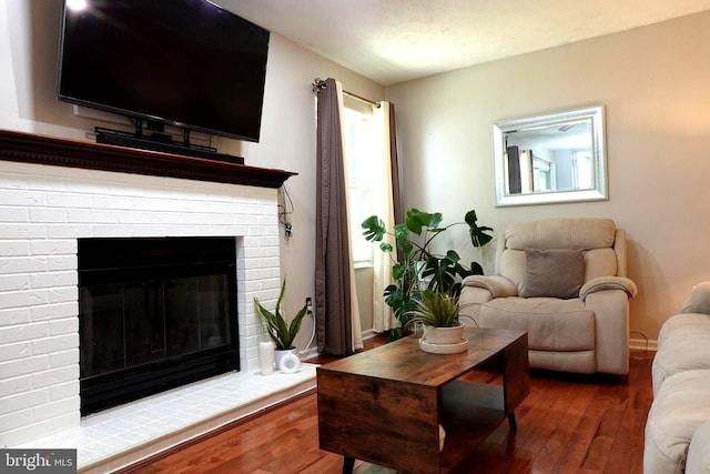 8307 Satinleaf Ct, Bowie, MD 20715 - living room featuring hardwood / wood-style floors and a fireplace