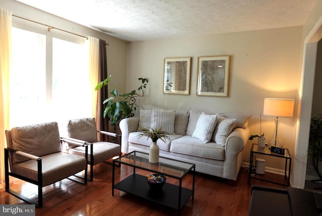 8307 Satinleaf Ct, Bowie, MD 20715 - living room featuring a textured ceiling and hardwood / wood-style flooring