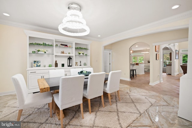 14 Waterfront Way, Hammonton, NJ 08037 - dining area featuring arched walkways, a chandelier, ornamental molding, recessed lighting, and baseboards