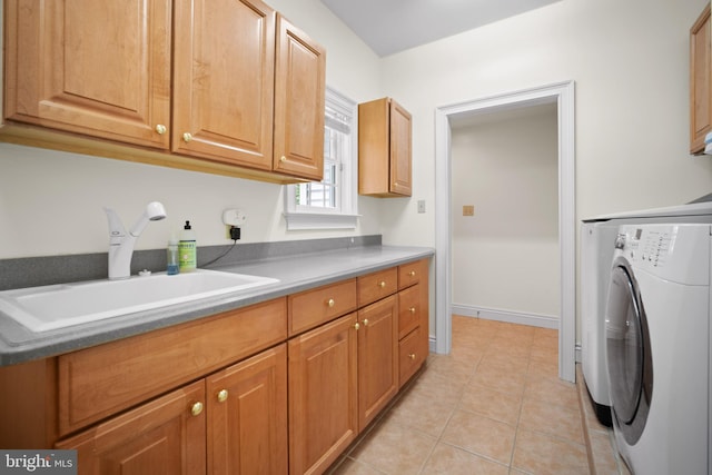 14 Waterfront Way, Hammonton, NJ 08037 - laundry area with cabinet space, light tile patterned floors, and washing machine and dryer