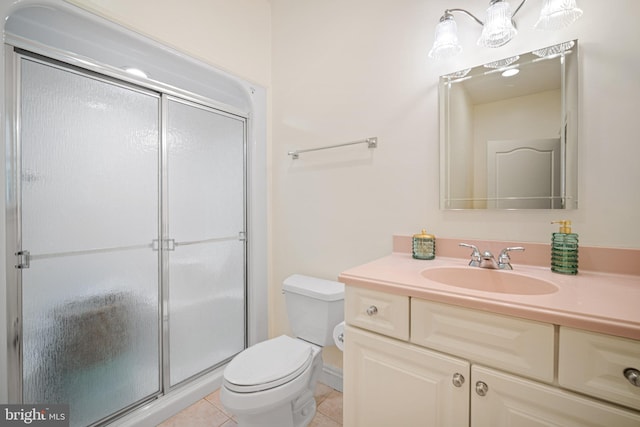 14 Waterfront Way, Hammonton, NJ 08037 - bathroom featuring vanity, toilet, tile patterned flooring, and a shower with shower door
