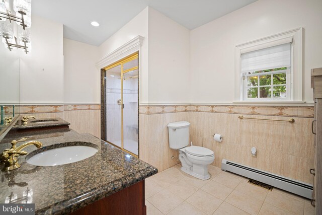 14 Waterfront Way, Hammonton, NJ 08037 - full bathroom featuring baseboard heating, tile walls, tile patterned flooring, a wainscoted wall, and a stall shower