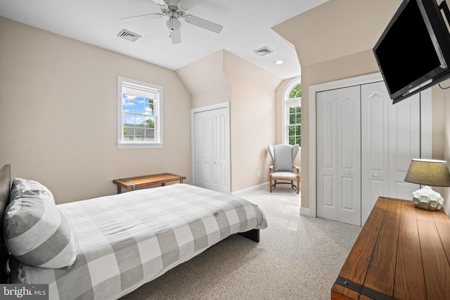 14 Waterfront Way, Hammonton, NJ 08037 - bedroom featuring two closets, baseboards, light colored carpet, lofted ceiling, and a ceiling fan