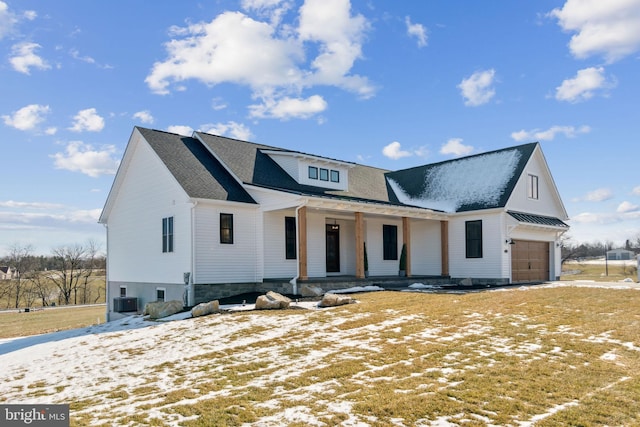 123 Quartz Ridge Rd Unit 28, Hanover, PA 17331 - modern inspired farmhouse with covered porch, central AC unit, an attached garage, and a shingled roof