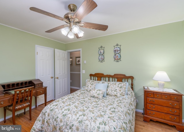 1733 Hilltop Ave, Baltimore, MD 21221 - bedroom with light wood-style flooring, crown molding, and a ceiling fan