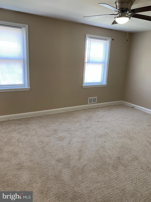 3918 Dudley Ave, Baltimore, MD 21213 - unfurnished room featuring ceiling fan, carpet flooring, and baseboards
