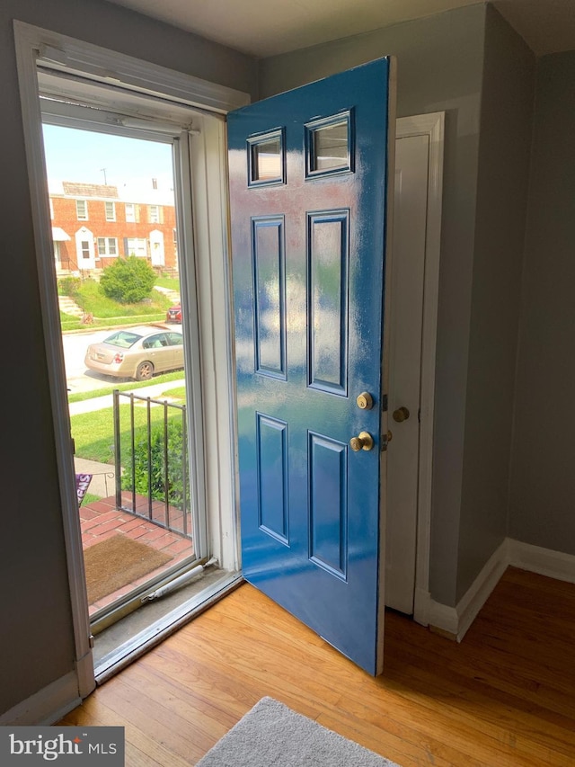 3918 Dudley Ave, Baltimore, MD 21213 - foyer entrance featuring wood finished floors and baseboards