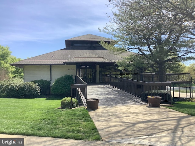 18302 Streamside Dr Unit 101, Gaithersburg, MD 20879 - view of front of property with a front lawn and a shingled roof