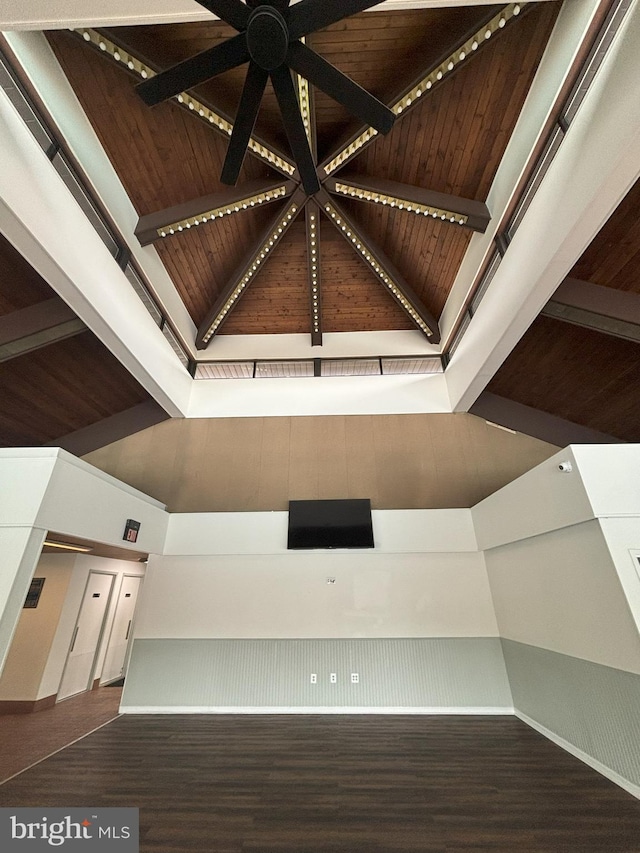 18302 Streamside Dr Unit 101, Gaithersburg, MD 20879 - detailed view of wood finished floors, a ceiling fan, wooden ceiling with exposed beams, and baseboards
