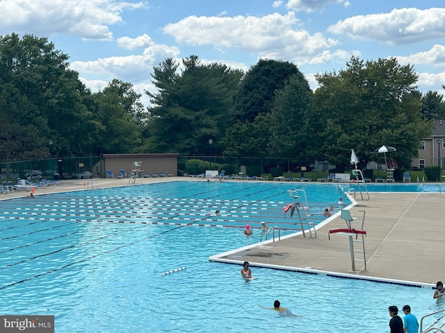 18302 Streamside Dr Unit 101, Gaithersburg, MD 20879 - community pool featuring a patio
