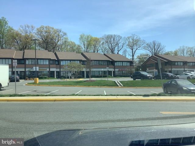 18302 Streamside Dr Unit 101, Gaithersburg, MD 20879 - view of front of home featuring uncovered parking
