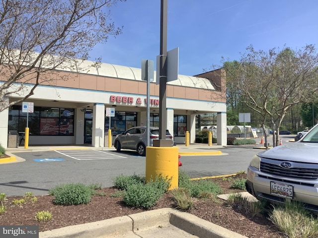 18302 Streamside Dr Unit 101, Gaithersburg, MD 20879 - view of commercial property featuring uncovered parking
