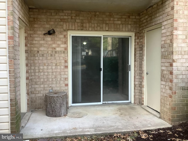 18302 Streamside Dr Unit 101, Gaithersburg, MD 20879 - property entrance with brick siding