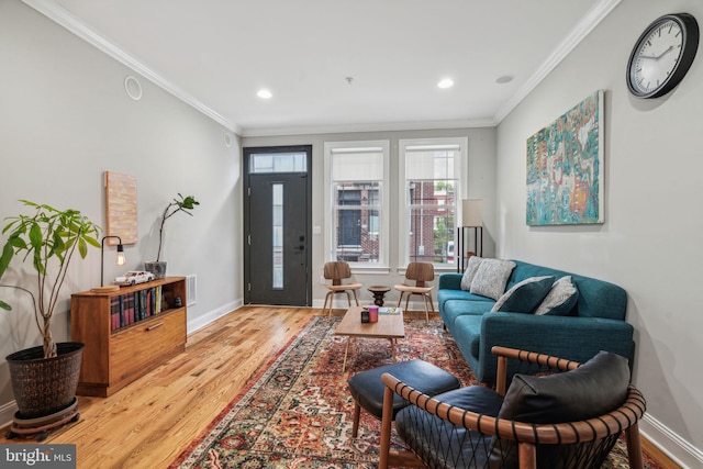 1444 N Myrtlewood St, Philadelphia, PA 19121 - living area with wood finished floors, ornamental molding, plenty of natural light, baseboards, and recessed lighting