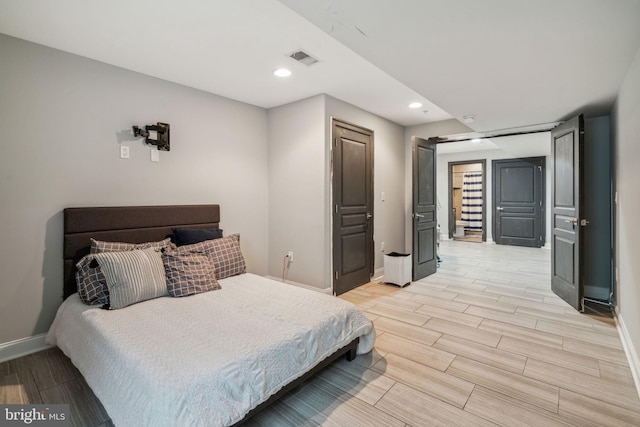 1444 N Myrtlewood St, Philadelphia, PA 19121 - bedroom featuring wood finish floors, baseboards, and recessed lighting