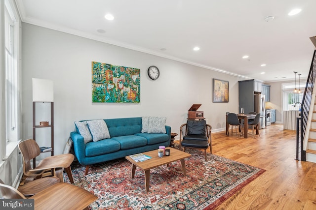 1444 N Myrtlewood St, Philadelphia, PA 19121 - living room with light wood-style floors, ornamental molding, recessed lighting, baseboards, and stairway