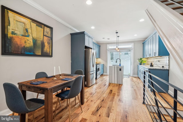 1444 N Myrtlewood St, Philadelphia, PA 19121 - dining space featuring ornamental molding, light wood finished floors, recessed lighting, and baseboards