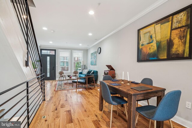 1444 N Myrtlewood St, Philadelphia, PA 19121 - dining room featuring crown molding, light wood finished floors, recessed lighting, and baseboards