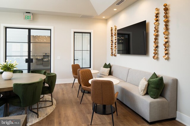 21 Kay Chiarello Way, Hamilton, NJ 08690 - living area featuring wood finished floors, vaulted ceiling, baseboards, and recessed lighting