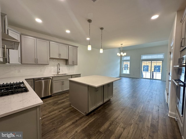 21 Kay Chiarello Way, Hamilton, NJ 08690 - kitchen with gray cabinetry, stainless steel appliances, a sink, dark wood finished floors, and recessed lighting