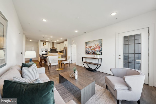 210 Decoverly Dr Unit 407, Gaithersburg, MD 20878 - living room featuring recessed lighting, wood finished floors, and baseboards