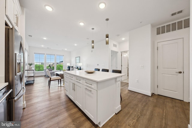 210 Decoverly Dr Unit 407, Gaithersburg, MD 20878 - kitchen featuring stainless steel fridge with ice dispenser, white cabinetry, open floor plan, light countertops, and recessed lighting