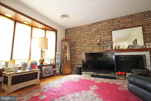 2732 Old Cedar Grove Rd, Broomall, PA 19008 - living area featuring a fireplace, wood finished floors, and crown molding