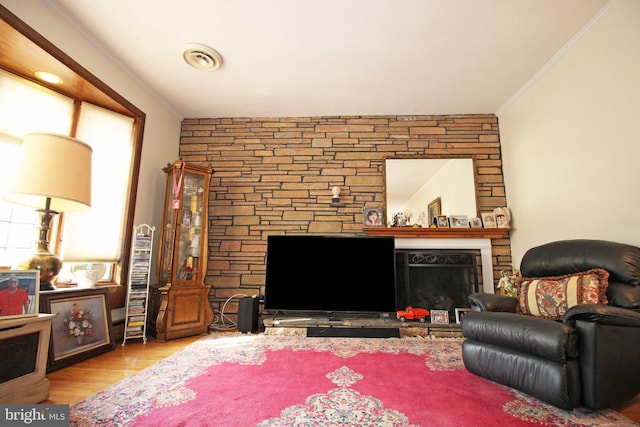 2732 Old Cedar Grove Rd, Broomall, PA 19008 - living area with ornamental molding, wood finished floors, and a fireplace