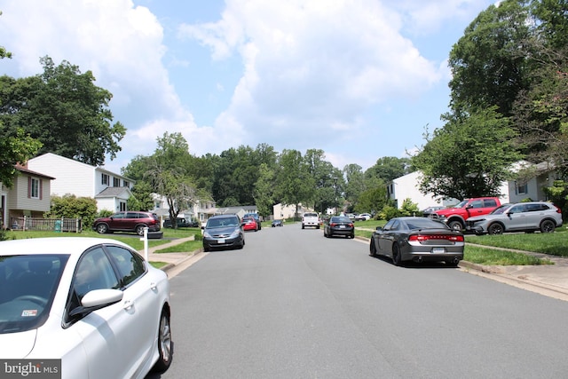 8406 Rainbow Bridge Ln, Springfield, VA 22153 - view of asphalt street featuring sidewalks, curbs, and a residential view