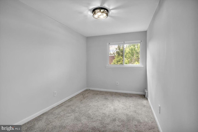 2429 Patton St, Camden, NJ 08104 - carpeted empty room with baseboards