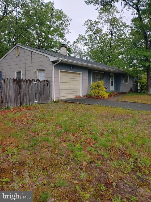 612 Deerhead Lake Dr, Forked River, NJ 08731 - ranch-style house featuring an attached garage and a chimney